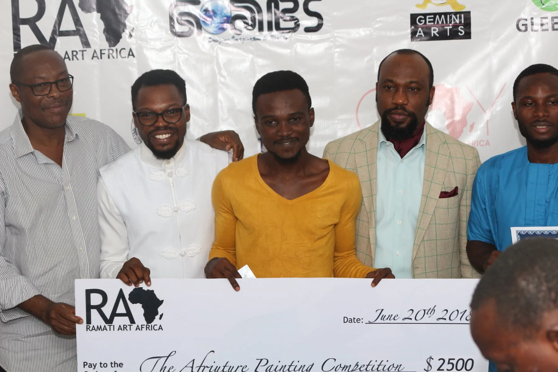 Julius Agbaje receiving the grant at the first Afriuture competition.